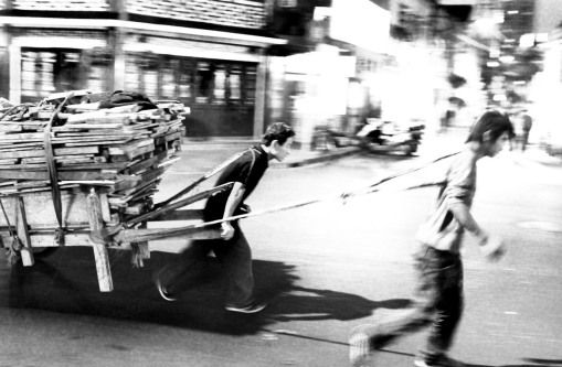 cart haulers Shanghai night city scene